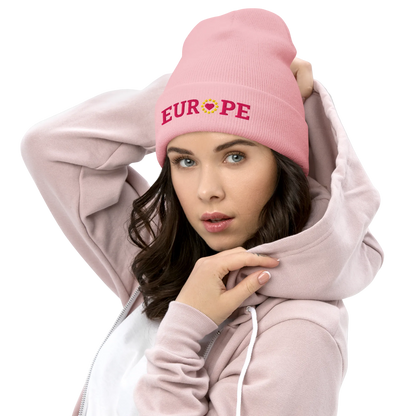 Female Model with Monochrome Pink "EUROPE" Cuffed Beanie with "Show the Love for Europe" emblem in full color