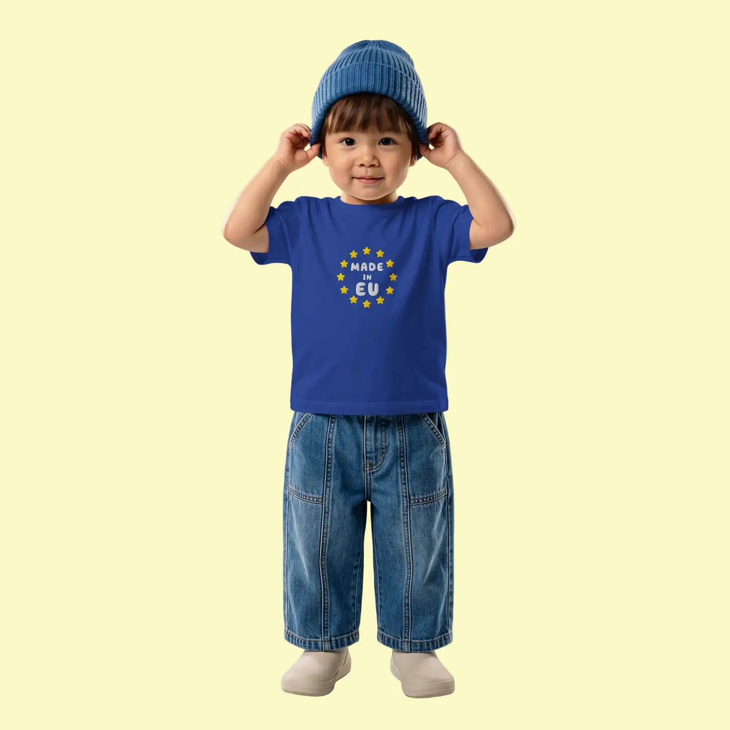 Navy Blue "Made in EU" Embroidered Baby T-shirt on a Boy Front View
