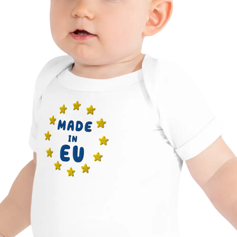 White "Made in EU" Embroidered Baby Bodysuit on a Toddler Front View Close-up
