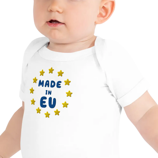 White "Made in EU" Embroidered Baby Bodysuit on a Toddler Front View Close-up