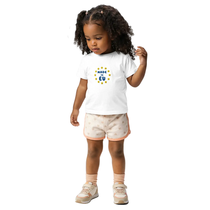 White "Made in EU" Embroidered Baby T-shirt on a Girl Front View